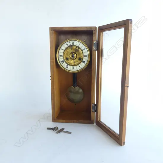 LATE 19thC CLOCK with suspended pendulum in later wooden case glazed door H.425mm w keys