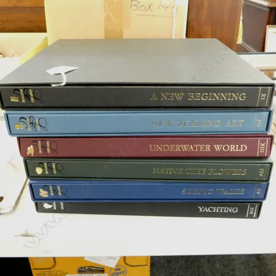 VOLS 11-16 CASED LTD ED NZ POST THEMED STAMP ALBUMS; YACHTING, NZ ART, UNDERWATER WORLD, NATIVE FLORA, SCENIC WALKS  ETC