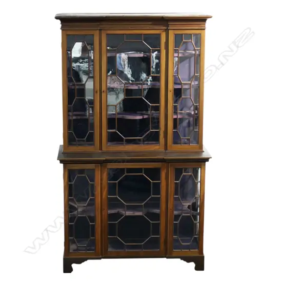 A late 19thC Georgian style mahogany breakfront bookcase/display cabinet,