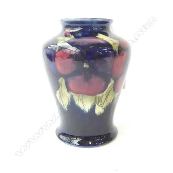 MOORCROFT PANSIES VASE on cobalt ground. Blue painted initials mark. H.130mm