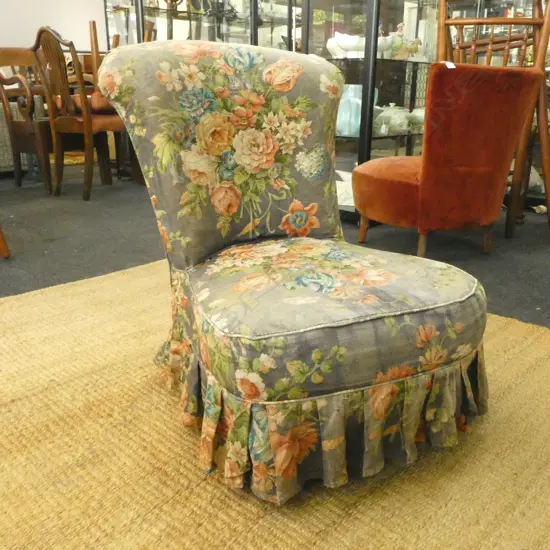 FLORAL UPHOLSTERD (WORN) NURSING CHAIR