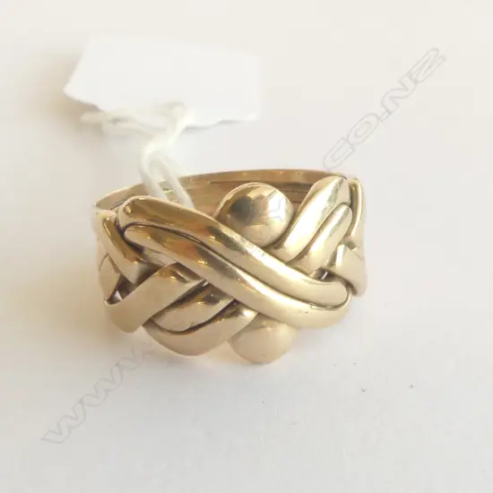 9ct PUZZLE STYLE RING, STAMPED 'BOND', 7.2gm SIZE T