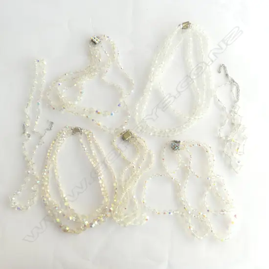 BAG OF CUT CRYSTAL NECKLACES