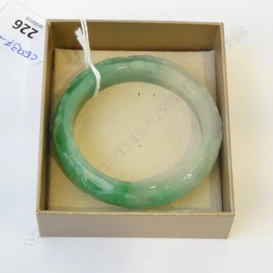 CARVED JADE BANGLE; INSIDE DIAMETER 5.7cm SMALL SIZE