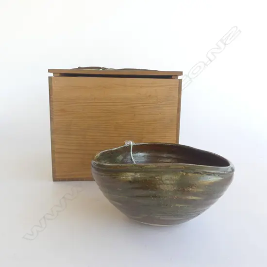 JAPANESE STUDIO POTTERY BOWL hand thrown then reshaped variable brown glaze w pale highlights Dia.180mm approx. Boxed