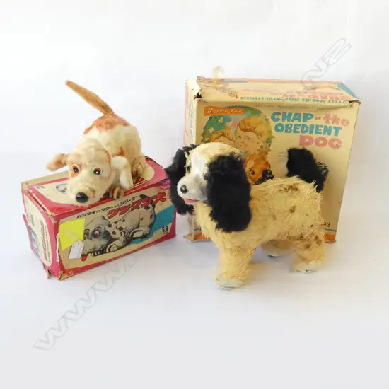 TWO VINTAGE JAPANESE BATTERY OPERATED TOY DOGS IN BOXES UNTESTED