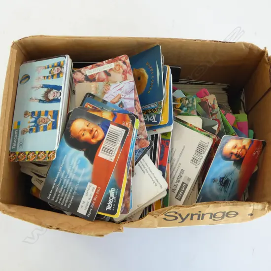 TWO BOXES OF TELECOM $5 & $10 PHONE CARDS
