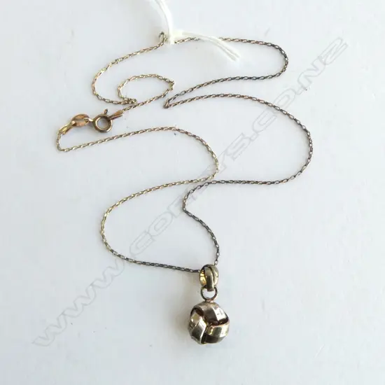 SILVER NECKLACE with SILVER KNOT DROP.