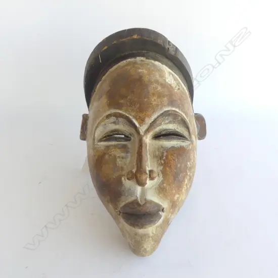AFRICAN VUVI MASK GABON H.330mm (DAMAGE TO ONE EAR). Provenance: Ex. The estate of John Perry.