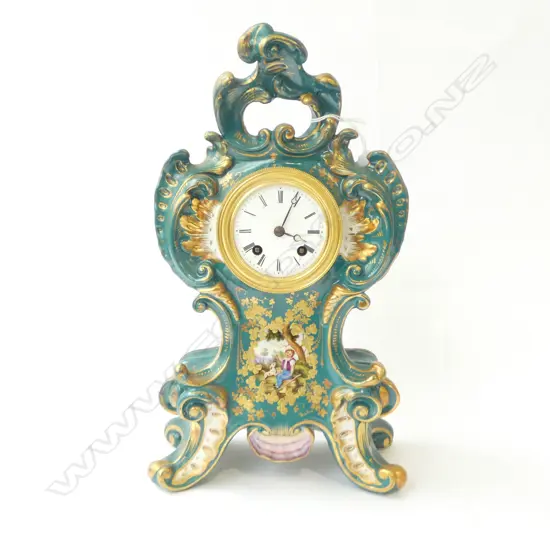 FRENCH PORCELAIN MANTLE CLOCK AND BASE, ESCUTCHEON SHAPED, HANDPAINTED PASTORAL SCENE, REPAIR TO CREST, H.330mm