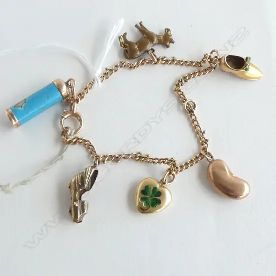 9ct GOLD CHARM BRACELET with 5 gold charms & 1 plated. 19gms