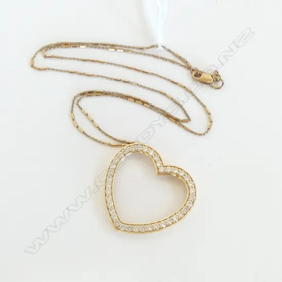 14CT GOLD AND C Z HEART WITH CHAIN 7.67gms