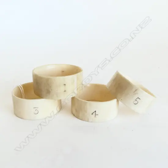 4 IVORY NAPKIN RINGS