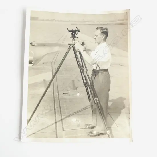 W. T. Hoff photographer attributed Flight Officer Buck taking a reading on the Bristol - silver gelatin print 255 x 200mm