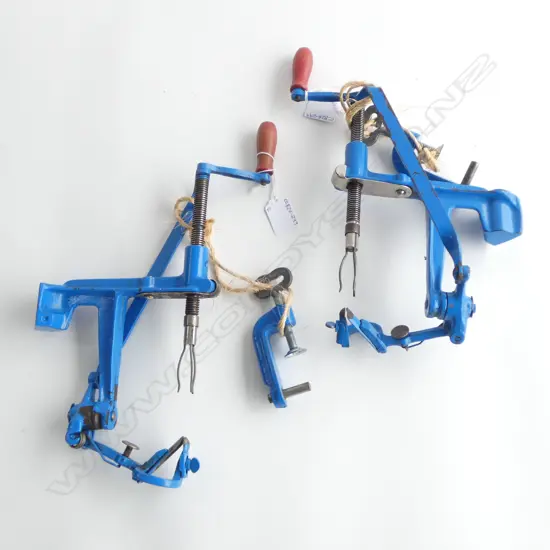 2 BLUE PAINTED CAST IRON HAND WOUND D.B. PATENT APPLE PEELERS, L.250mm