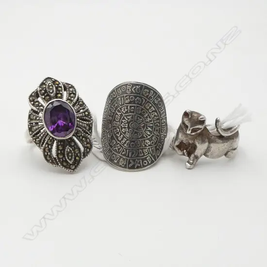 THREE SILVER RINGS; AMETHYST, CAT & COIN