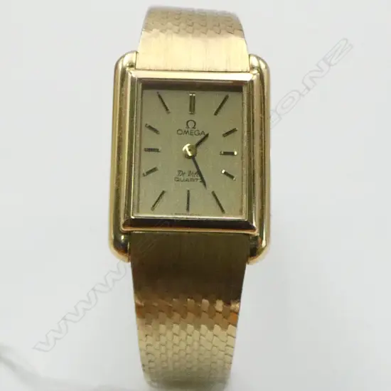 VINTAGE OMEGA De Ville quartz SILVER GILT & STEEL LADIES WRISTWATCH. With box & papers dated 1981