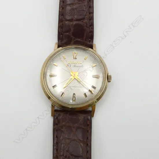 VINTAGE BULOVA AUTOMATIC 23 jewels GENT'S GOLD PLATE & stainless WRISTWATCH w leather strap. c.1970/1980. Working
