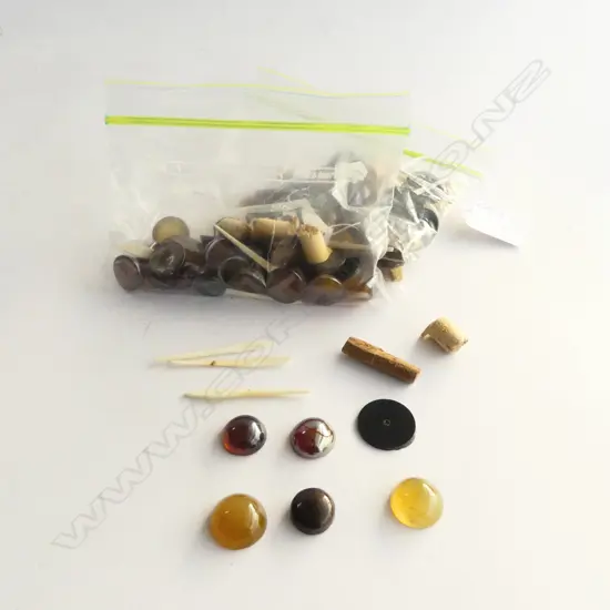 2 BAGS OF oriental SNUFF BOTTLE TOPS of various dark amber toned & other stones & gems + corks + spoons
