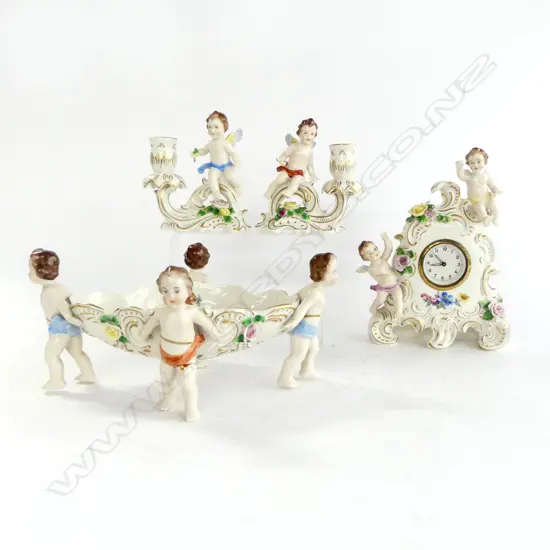 4 PCES GERMAN DRESDEN CHERUB CHINA; CLOCK, PR CANDLEHOLDERS, BOWL (LEG REPAIRED) W.290mm