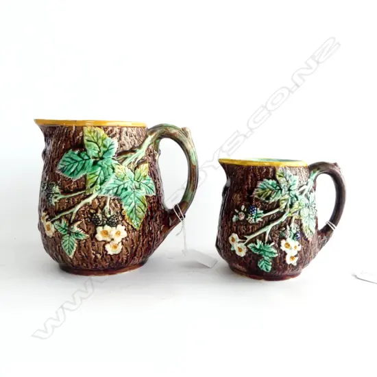 PR WEDGWOOD MAJOLICA c.1900 TRICKLE GLAZE JUGS, LEAF & BERRY, HAIRLINE TO SMALL BASE ( STAMPED) Sm H.110 L.145mm