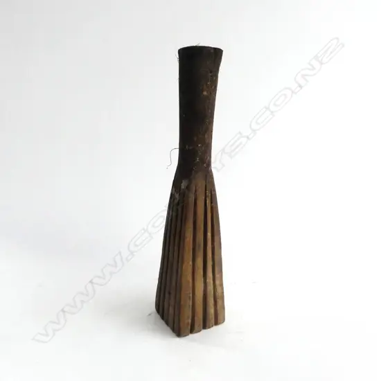 An old Tongan tapa beater (ta tutu) with four tapering faces with deeply incised grooves