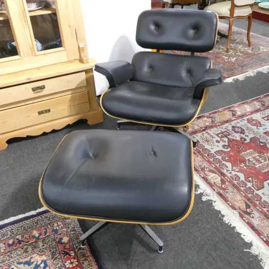 EAMES  STYLE LOUNGE CHAIR & OTTOMAN WITH ONE BUTTON MISSING