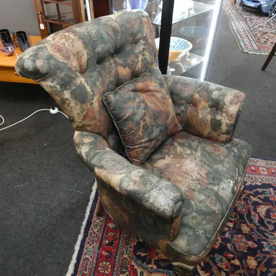 UPHOLSTERED ARMCHAIR