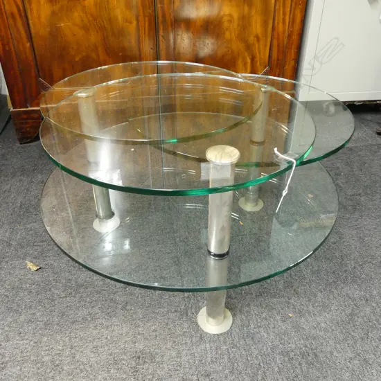 GLASS COFFEE TABLE; RONALD SCHMITT K75 GIRONDA; 3 ROUND PIVOTING TOPS 550mm dia ABOVE 1 760mm dia, CHROME FRAME 