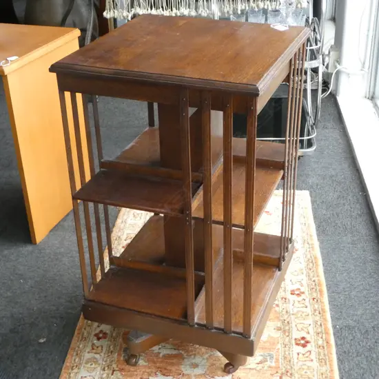 EARLY 20thC OAK REVOLVING SQUARE BOOKCASE 470 x 480 x 865mm brown porcelain castors