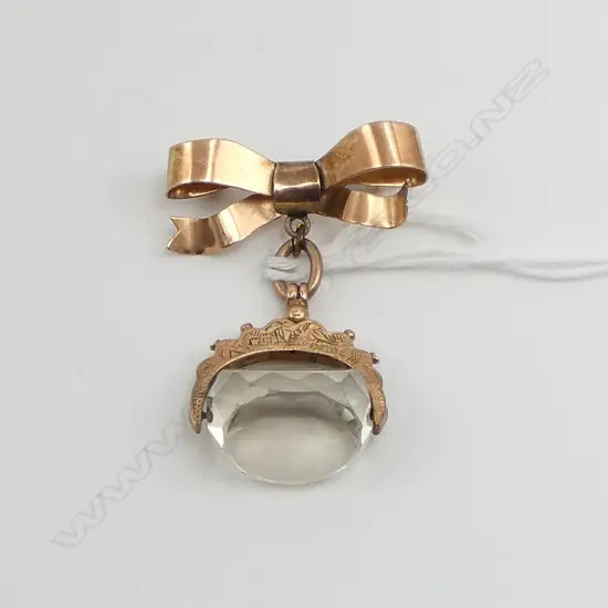 9ct GOLD c.1900 &  QUARTZ FOB SPINNER ON 9ct GOLD BOW BROOCH suspension. Hallmarked. 8.66gms