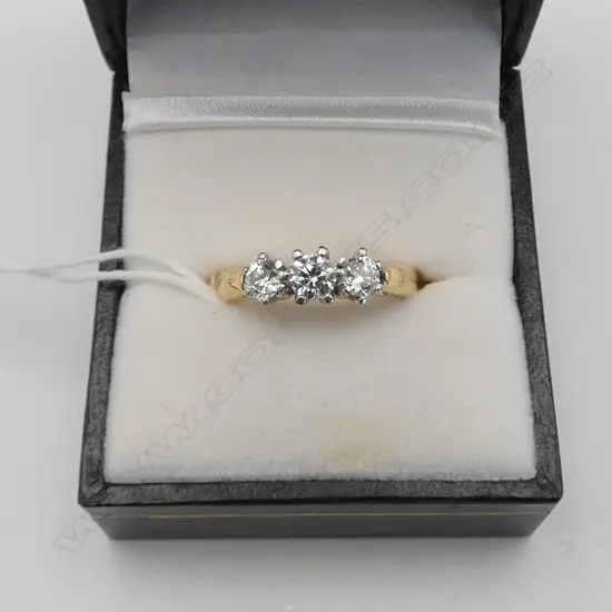 18CT GOLD 3 STONE DIAMOND RING 5GRMS (0.76CT WEIGHT total) SIZE Q