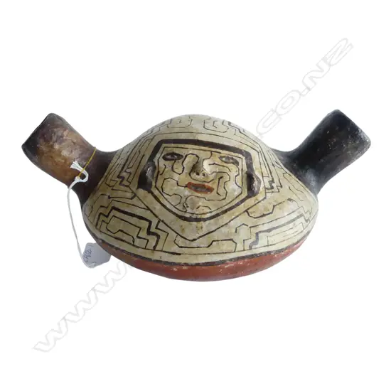 **RTV** PERUVIAN SHIPIBO POTTERY VESSEL with twin spouts, Labelled 'Amazon River',  with pigment painted geomet
