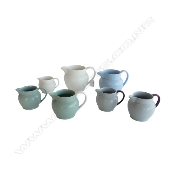 COLLECTION OF 7 PLAIN GLAZE WEDGWOOD JUGS
