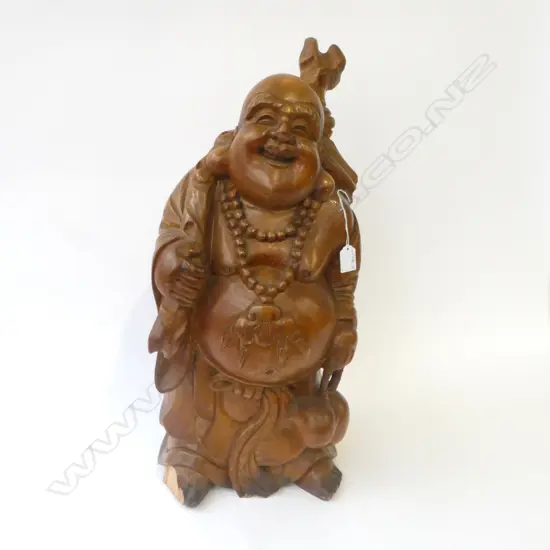 An early to mid 20thC Japanese large carved wood Hotei sculpture,
