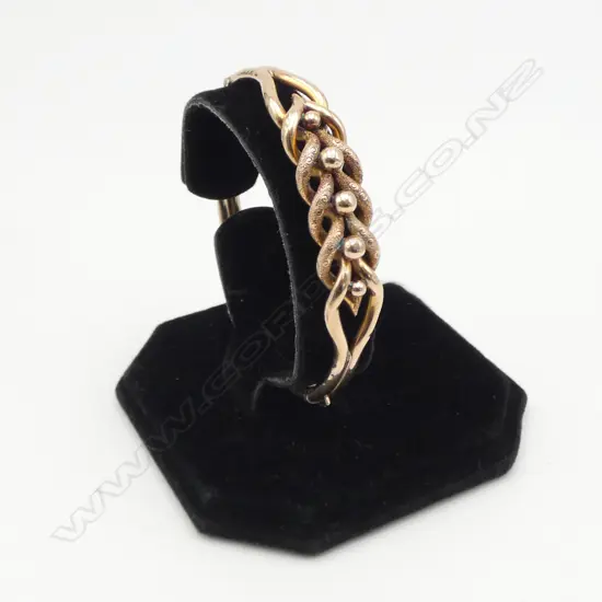 9CT GOLD HINGED BANGLE  (old dents) 9.32gms