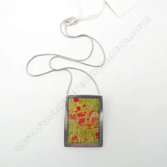 JO LUPING SILVER POPPY PENDANT on SILVER CHAIN, can also be worn as a brooch