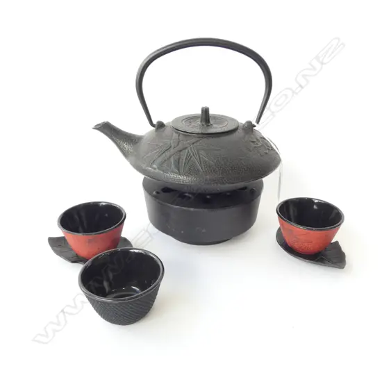 7 PCE JAPANESE CAST IRON TEA SET; TEAPOT, BURNER, 3 CUPS, 2 LEAF SAUCERS