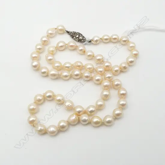 SINGLE STRAND OF SEMI-BAROQUE PEARLS