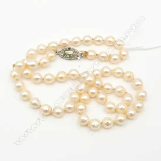 SINGLE STRAND OF SEMI-BAROQUE PEARLS