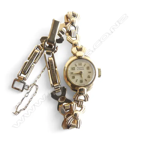 ROTARY MOVEMENT ON 9ct GOLD CHAIN 1.83gms including movement