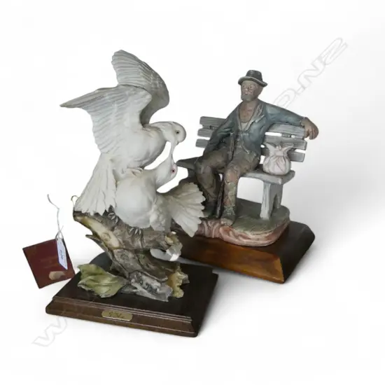 2 CAPODIMONTE STYLE FIGURINES; MAN ON BENCH (HAND REPAIRED), A. BELCARI DOVES H.295mm