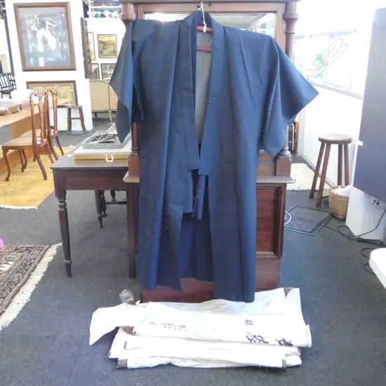 FOUR VINTAGE KIMONO IN ORIGINAL PACKAGING