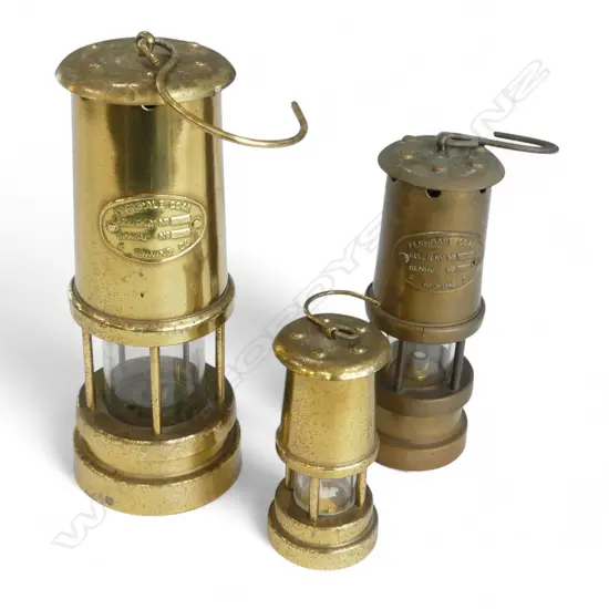 THREE BRASS MINER'S LAMPS; 2 'FERNDALE COAL', TALLEST H.230mm