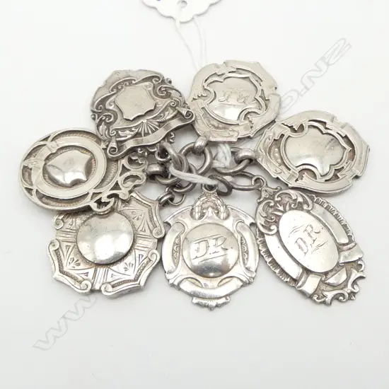 7 1930's SILVER FOB MEDALLIONS possibly race horse prizes 63gms 