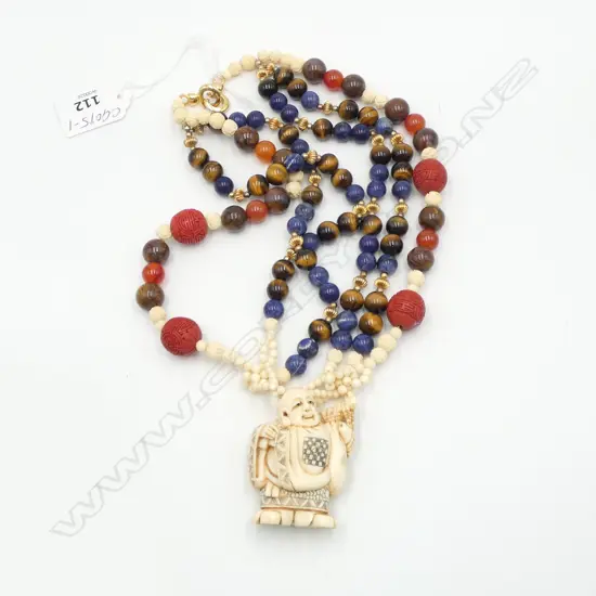 **RTV** ORIENTAL NECKLACE WITH CINNABAR/IVORY/LAPIS terminating in an ivory netsuke