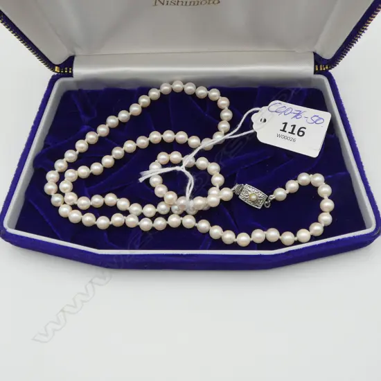 VINTAGE NISHIMOTO STRAND UNIFORM CULTURED PEARLS L.600mm. W silver clasp. In box w paper work
