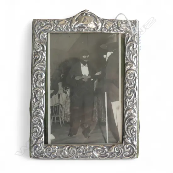 Edwardian silver photo frame. Birmingham 1903. Embossed scrolls H.180mm