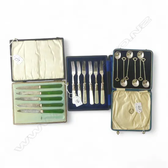 5 BOXED BUTTER KNIVES GREEN PLASTIC?  HANDLES, 6 EP TEASPOONS WITH PENTAGONAL SHAPED PROXIMAL END, & 6 MOP HANDLED CAKE 