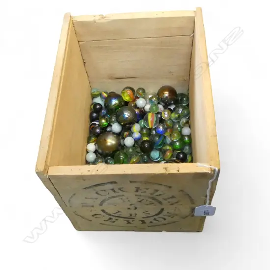 GLASS MARBLES IN CRATE
